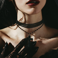 Funeral Bow choker worn with lace gloves