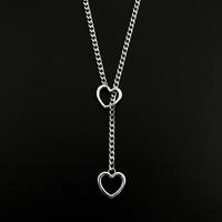 Heartstopper lariat in silver on black