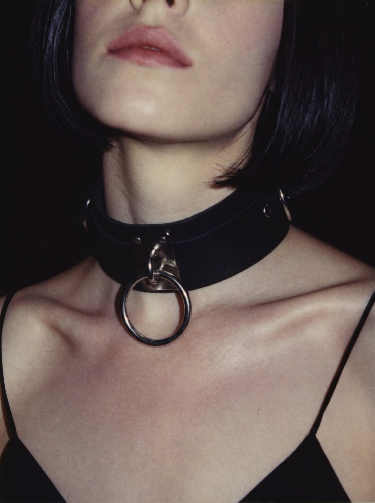 Model wearing the Ring Leader O-ring leather collar, close-up