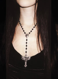 Model wearing the Last Rites rosary, close-up